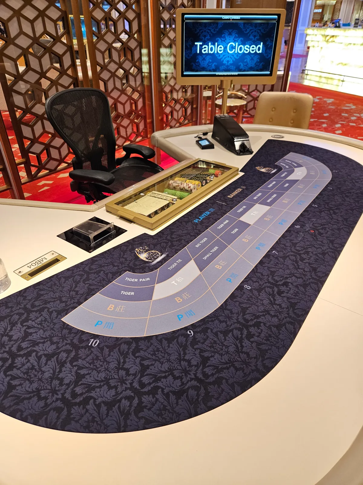 Upholstered casino gaming table in a club gaming room